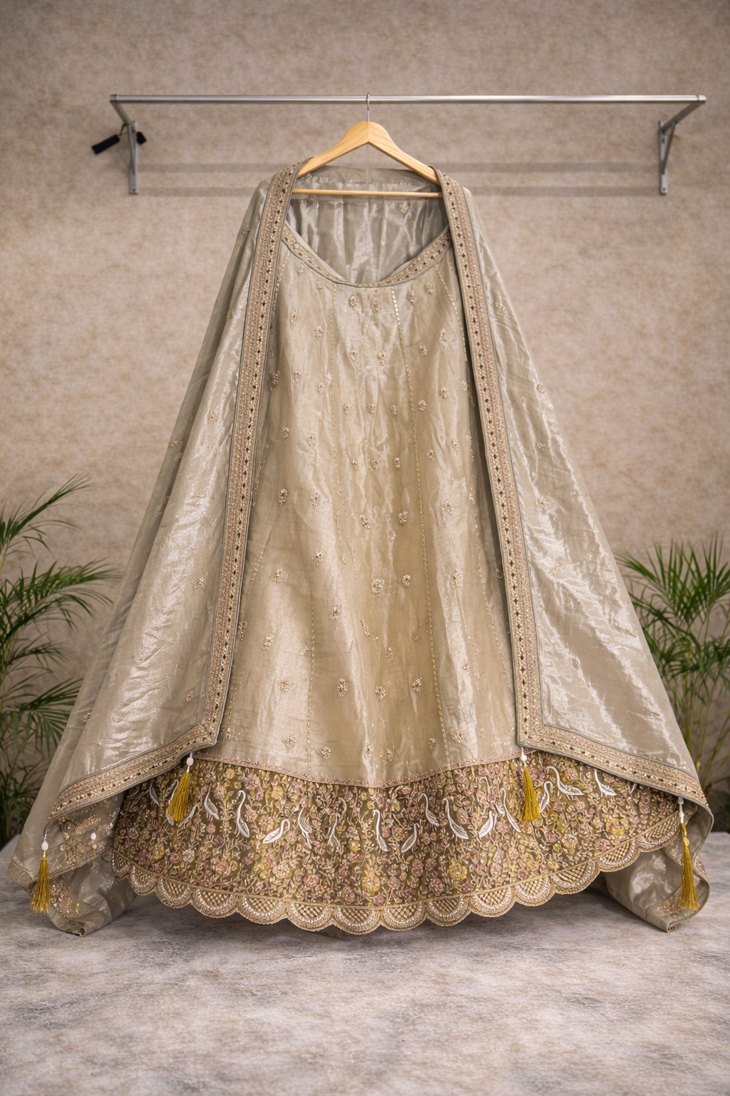 Champagne gold bridal lehenga with maggam work blouse and swan border